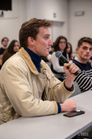 Antoine du Fayet de la Tour, MATA ’27, puts a question to the panel during “Resetting Transatlantic Relations One Year After the US Elections.” Antoine du Fayet de la Tour, MATA ’27, puts a question to the panel during “Resetting Transatlantic Relations One Year After the US Elections.”